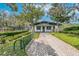 Tennis club house with landscaping at 5608 Rockfield Loop, Valrico, FL 33596