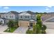 Two-story house in a community with similar homes at 5636 Silver Sun Dr, Apollo Beach, FL 33572