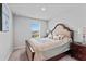 Spacious bedroom with large bed and window seat at 5636 Silver Sun Dr, Apollo Beach, FL 33572