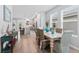 Bright dining room with a light-wood table and wicker chairs at 5636 Silver Sun Dr, Apollo Beach, FL 33572