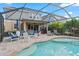 Relaxing screened pool and patio area at 5636 Silver Sun Dr, Apollo Beach, FL 33572