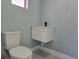 Modern bathroom with floating vanity and updated fixtures at 6413 N 48Th St, Tampa, FL 33610