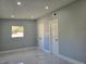 Spacious bedroom with two closets and tile flooring at 6413 N 48Th St, Tampa, FL 33610