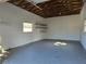 Spacious garage interior with built-in shelves, offering ample storage at 6413 N 48Th St, Tampa, FL 33610