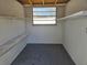 Small garage with simple shelves offering extra storage space at 6413 N 48Th St, Tampa, FL 33610