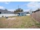 Large backyard with fire pit and shed at 8907 N Boulevard, Tampa, FL 33604