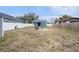 Large backyard with fire pit and shed at 8907 N Boulevard, Tampa, FL 33604