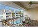 Private balcony overlooking the community pool and surrounding area at 9341 Blind Pass Rd, St Pete Beach, FL 33706