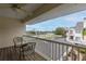 Balcony with seating area and views of the neighborhood and water at 9341 Blind Pass Rd, St Pete Beach, FL 33706