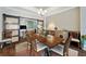 Elegant dining room with a rustic wood table and sliding barn doors at 2715 9Th N Ave, St Petersburg, FL 33713