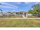 House with black fence and gate, view from across the street at 2715 9Th N Ave, St Petersburg, FL 33713