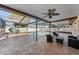 Relaxing pool area with covered patio and seating at 11001 Hobson St, Spring Hill, FL 34608