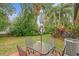 Private patio with table and chairs, perfect for outdoor dining at 11511 113Th St # 12C, Seminole, FL 33778