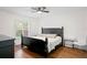 Spacious bedroom with a king-size bed and plenty of natural light at 11511 113Th St # 12C, Seminole, FL 33778