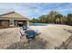 Relaxing pool area with patio furniture and covered seating at 11810 Winterset Cove Dr, Riverview, FL 33579