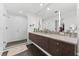 Modern bathroom with double vanity, large shower, and stylish fixtures at 1208 E Kennedy Blvd # 410, Tampa, FL 33602