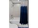 Simple bathroom with a bathtub and shower at 1208 E Kennedy Blvd # 410, Tampa, FL 33602