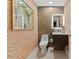 Stylish bathroom with updated fixtures and modern wallpaper at 1208 E Kennedy Blvd # 410, Tampa, FL 33602