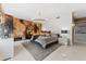 Spacious bedroom with large bed, decorative wall, and chandelier at 1208 E Kennedy Blvd # 410, Tampa, FL 33602
