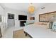 Spacious bedroom with ample closet space and a large TV at 1208 E Kennedy Blvd # 410, Tampa, FL 33602