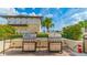 Community grilling area with two built-in grills and fire extinguisher at 1208 E Kennedy Blvd # 410, Tampa, FL 33602