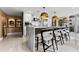 Modern kitchen with island, stainless steel appliances, and white cabinetry at 1208 E Kennedy Blvd # 410, Tampa, FL 33602
