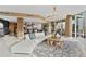 Open concept living room and kitchen with modern appliances and a large island at 1208 E Kennedy Blvd # 410, Tampa, FL 33602