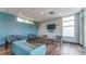 Community lounge with comfortable seating and a TV at 1208 E Kennedy Blvd # 410, Tampa, FL 33602