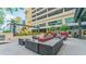 Community patio with fire pit and modern seating at 1208 E Kennedy Blvd # 410, Tampa, FL 33602