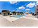 Resort-style pool with ample deck space and cabanas at 1208 E Kennedy Blvd # 410, Tampa, FL 33602