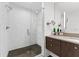 Large walk-in shower with glass enclosure and modern tile at 1208 E Kennedy Blvd # 410, Tampa, FL 33602