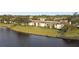 Condo building exterior view by the canal at 130 Lakeview Way # 130, Oldsmar, FL 34677