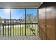 Screened balcony overlooking a tranquil lake at 130 Lakeview Way # 130, Oldsmar, FL 34677