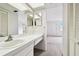 Bathroom with vanity and view of bedroom at 130 Lakeview Way # 130, Oldsmar, FL 34677