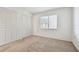 Bright bedroom with window and large closet at 130 Lakeview Way # 130, Oldsmar, FL 34677