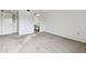 Bright bedroom with neutral walls and carpeting at 130 Lakeview Way # 130, Oldsmar, FL 34677