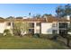 Condo building exterior with landscaping at 130 Lakeview Way # 130, Oldsmar, FL 34677
