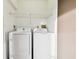 Bright laundry room with Samsung washer and dryer at 130 Lakeview Way # 130, Oldsmar, FL 34677