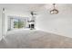 Living room with fireplace and access to balcony at 130 Lakeview Way # 130, Oldsmar, FL 34677