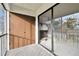 Relaxing screened balcony with access to interior fireplace at 130 Lakeview Way # 130, Oldsmar, FL 34677