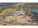 Community overview featuring clubhouse, pool, and green spaces at 1354 Emerald Dunes Dr, Sun City Center, FL 33573