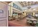 Community bar with seating and a large mural at 1354 Emerald Dunes Dr, Sun City Center, FL 33573