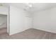 Well-lit bedroom with carpet and double door closet at 1354 Emerald Dunes Dr, Sun City Center, FL 33573