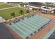 Expansive shuffleboard court with ample seating at 1354 Emerald Dunes Dr, Sun City Center, FL 33573