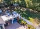 Backyard overview, showing pergola and shed at 1503 Limona Rd, Brandon, FL 33510