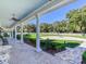 Spacious back porch overlooking fountain and gardens at 1503 Limona Rd, Brandon, FL 33510