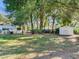 Spacious backyard with shed and trees at 1503 Limona Rd, Brandon, FL 33510