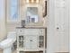 Elegant bathroom with white vanity and a toilet at 1503 Limona Rd, Brandon, FL 33510
