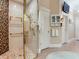 Walk-in shower with glass enclosure and mosaic tile at 1503 Limona Rd, Brandon, FL 33510