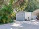Long driveway with carport and detached garage at 1503 Limona Rd, Brandon, FL 33510